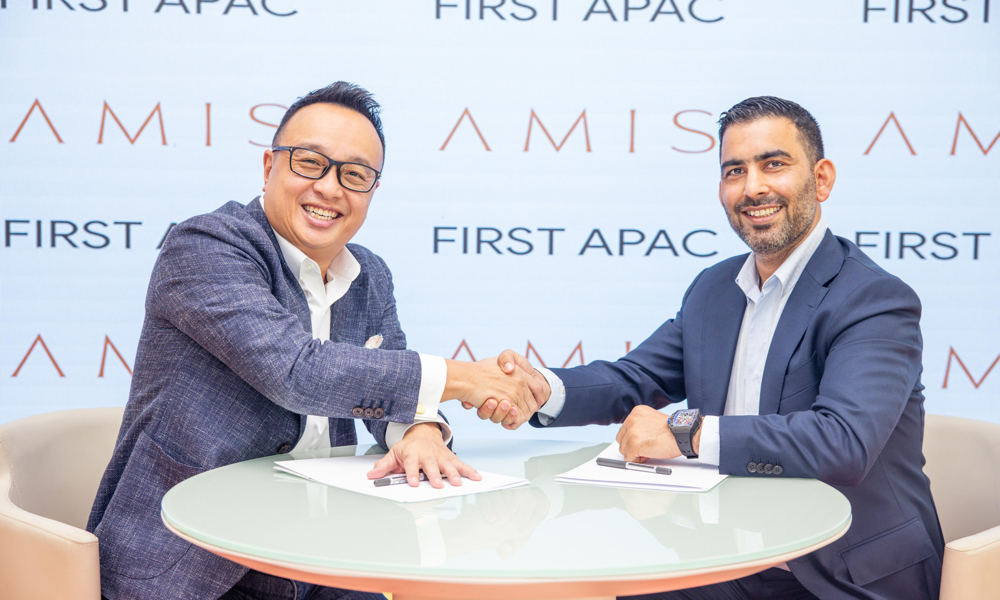 Left-to-right-Darrell-Lim-Founder-and-Shareholder-of-the-First-APAC-Fund-VCC-and-Neeraj-Mishra-Founder-and-CEO-of-AMIS-Development-during-the-MoU-signing-1.jpg